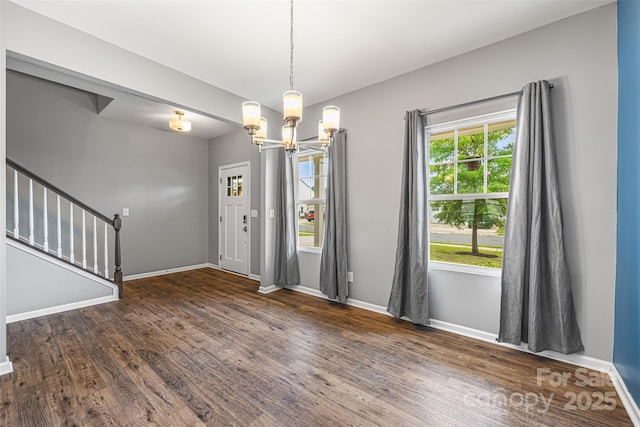 3053 Riker St, Clover, SC 29710 - entrance foyer featuring a chandelier, wood finished floors, baseboards, and stairway