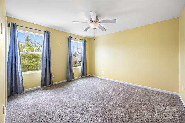 3053 Riker St, Clover, SC 29710 - empty room with carpet floors, a ceiling fan, and baseboards
