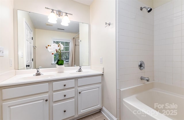 1136 W 1st St, Charlotte, NC 28202 - bathroom featuring double vanity and tub / shower combination