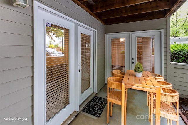 1136 W 1st St, Charlotte, NC 28202 - sunroom / solarium featuring outdoor dining space, healthy amount of natural light, and wooden walls