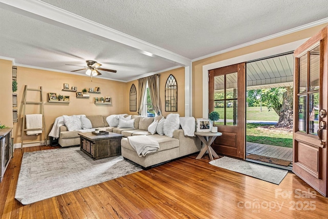 454 N Eastway Dr, Troutman, NC 28166 - living area featuring a textured ceiling, light wood-style floors, crown molding, and ceiling fan