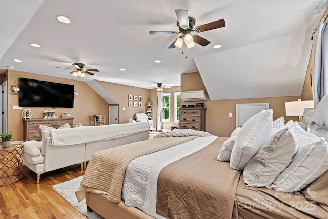 454 N Eastway Dr, Troutman, NC 28166 - bedroom with a wall unit AC, recessed lighting, wood finished floors, and ceiling fan