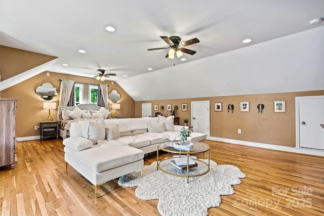 454 N Eastway Dr, Troutman, NC 28166 - living room featuring ceiling fan, vaulted ceiling, baseboards, light wood finished floors, and recessed lighting