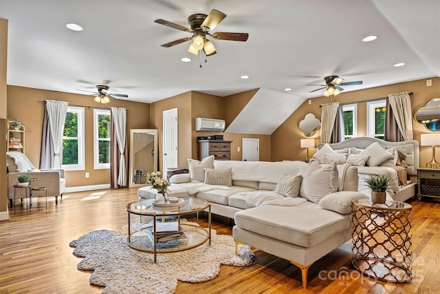 454 N Eastway Dr, Troutman, NC 28166 - living area with ceiling fan, light wood-style flooring, recessed lighting, a wall unit AC, and vaulted ceiling