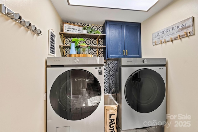 454 N Eastway Dr, Troutman, NC 28166 - laundry room featuring washer and dryer and cabinet space