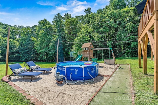 454 N Eastway Dr, Troutman, NC 28166 - view of grassy yard featuring a playground