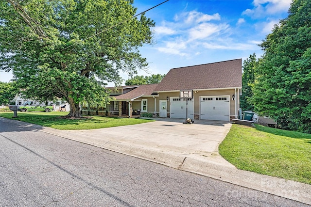 454 N Eastway Dr, Troutman, NC 28166 - view of front of property featuring driveway, an attached garage, a front lawn, and a shingled roof
