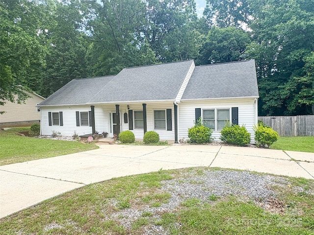 3430 Fincher Blvd, Charlotte, NC 28269 - view of front of house with a porch, concrete driveway, and a shingled roof