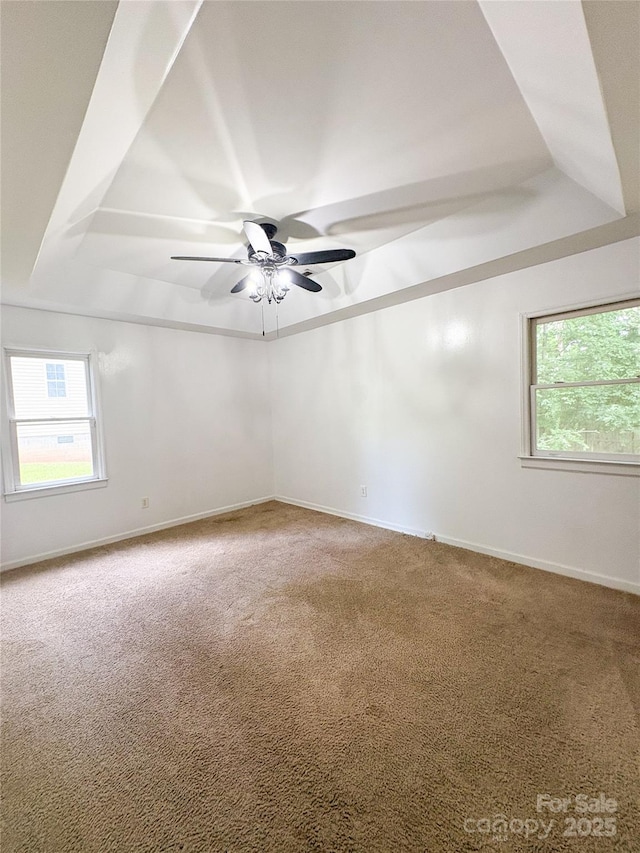 3430 Fincher Blvd, Charlotte, NC 28269 - unfurnished room with a raised ceiling, carpet flooring, a ceiling fan, and baseboards