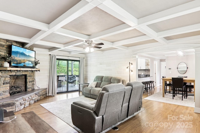 68 Broyles Rd, Hendersonville, NC 28791 - living room with a fireplace, coffered ceiling, light wood-style flooring, ceiling fan, and beam ceiling