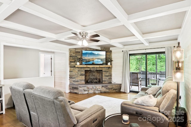 68 Broyles Rd, Hendersonville, NC 28791 - living room with wood finished floors, a fireplace, ceiling fan, coffered ceiling, and beam ceiling