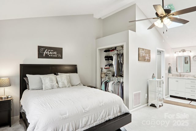 68 Broyles Rd, Hendersonville, NC 28791 - bedroom with light carpet, high vaulted ceiling, a closet, baseboards, and a sink