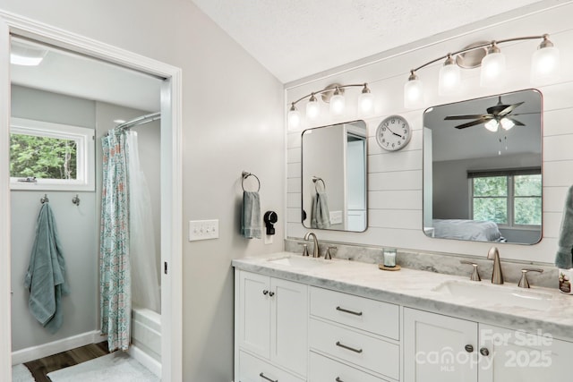 68 Broyles Rd, Hendersonville, NC 28791 - full bathroom featuring double vanity, healthy amount of natural light, a ceiling fan, connected bathroom, and lofted ceiling