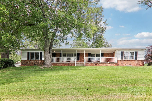 68 Broyles Rd, Hendersonville, NC 28791 - single story home with brick siding, a front yard, and a porch