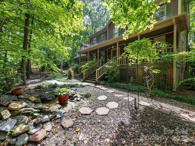 10710 Bristlecone Ct, Mint Hill, NC 28227 - back of property with a porch and stairway