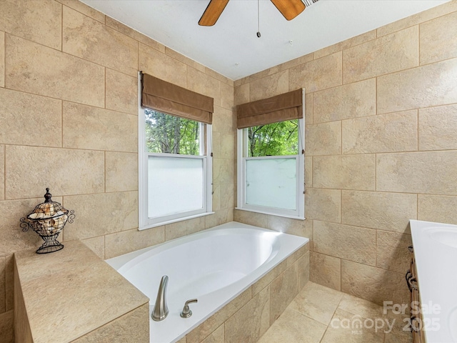 10710 Bristlecone Ct, Mint Hill, NC 28227 - bathroom featuring a garden tub, ceiling fan, and vanity
