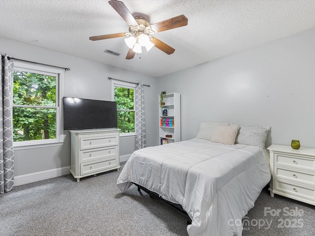 10710 Bristlecone Ct, Mint Hill, NC 28227 - bedroom with carpet floors, a textured ceiling, and a ceiling fan