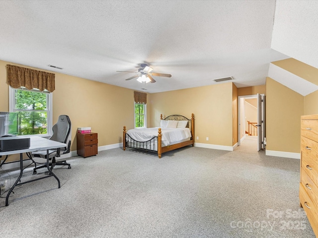 10710 Bristlecone Ct, Mint Hill, NC 28227 - carpeted bedroom with multiple windows, a textured ceiling, ceiling fan, and an office area