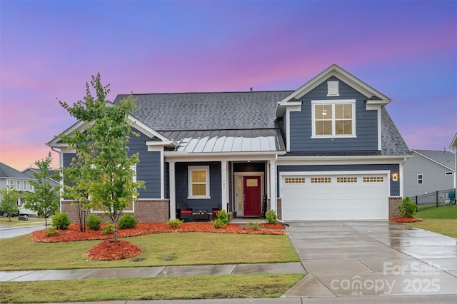 705 Hinterland Ln, Matthews, NC 28104 - view of front of property featuring brick siding, covered porch, driveway, a standing seam roof, and a shingled roof