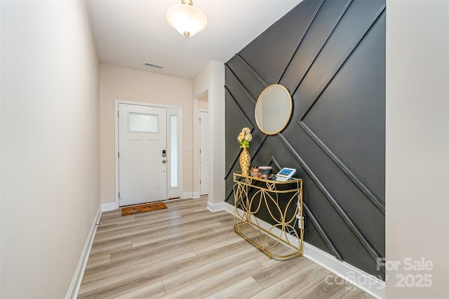 705 Hinterland Ln, Matthews, NC 28104 - entryway with wood finished floors and baseboards