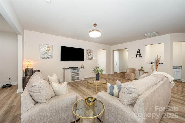 705 Hinterland Ln, Matthews, NC 28104 - living area with light wood-type flooring and baseboards