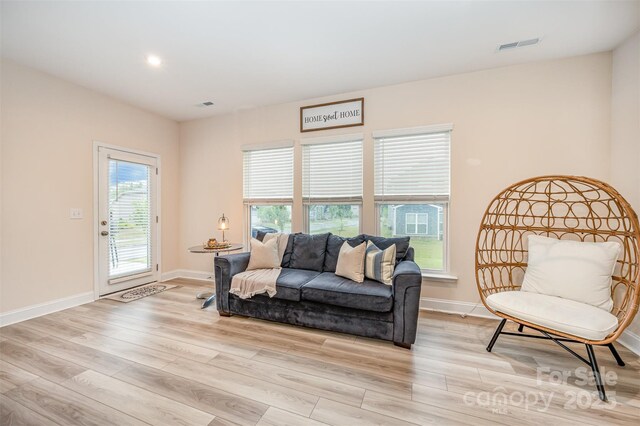 705 Hinterland Ln, Matthews, NC 28104 - living area with light wood-style flooring, baseboards, and recessed lighting
