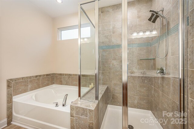 705 Hinterland Ln, Matthews, NC 28104 - full bath with a shower stall, a bath, and recessed lighting