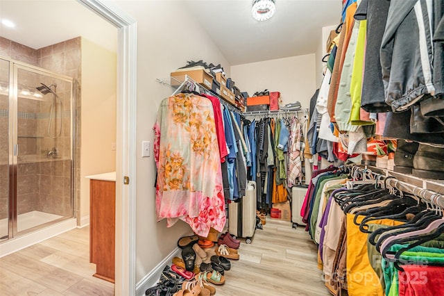 705 Hinterland Ln, Matthews, NC 28104 - walk in closet featuring wood finished floors