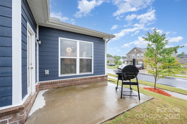705 Hinterland Ln, Matthews, NC 28104 - view of patio / terrace with area for grilling and a residential view