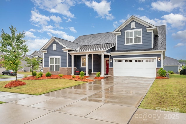 705 Hinterland Ln, Matthews, NC 28104 - view of front facade with brick siding, driveway, a standing seam roof, and a front lawn