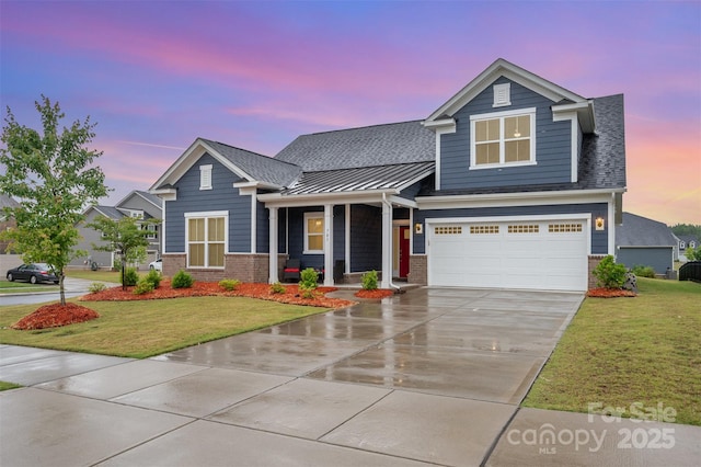 705 Hinterland Ln, Matthews, NC 28104 - view of front facade featuring brick siding, driveway, a lawn, and a standing seam roof