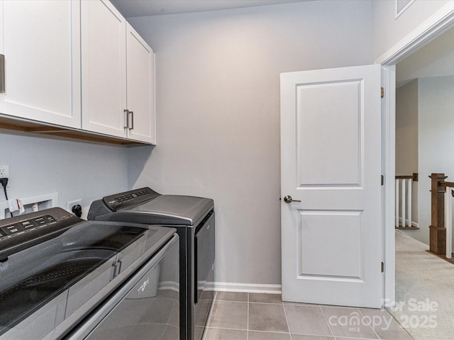 5811 Mantle Way, Kannapolis, NC 28081 - laundry area featuring cabinet space, washing machine and dryer, baseboards, and light tile patterned floors
