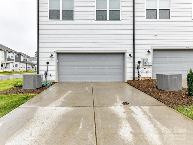 5811 Mantle Way, Kannapolis, NC 28081 - garage with central air condition unit and concrete driveway