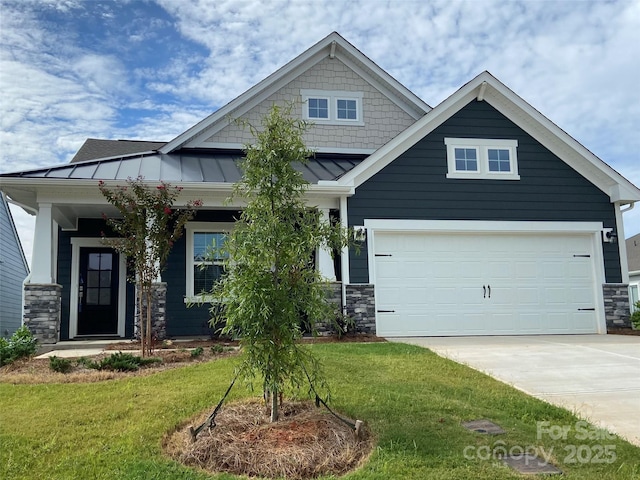 108 Red Juniper Way, Statesville, NC 28625 - craftsman house with stone siding, driveway, a front yard, a standing seam roof, and metal roof