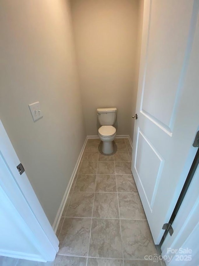 108 Red Juniper Way, Statesville, NC 28625 - bathroom featuring toilet, baseboards, and tile patterned flooring