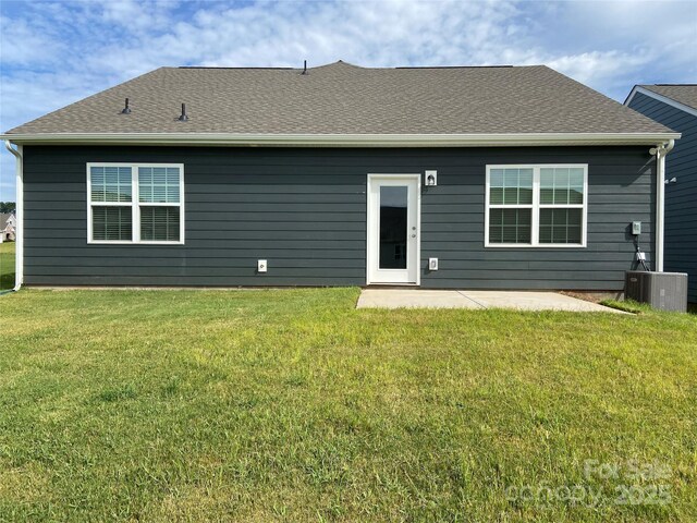 108 Red Juniper Way, Statesville, NC 28625 - back of house with a patio, a lawn, central air condition unit, and roof with shingles