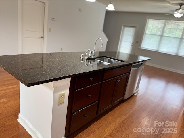 129 Steinbeck Way Unit B, Mooresville, NC 28117 - kitchen featuring a sink, dishwasher, a center island with sink, a ceiling fan, and light wood-style floors