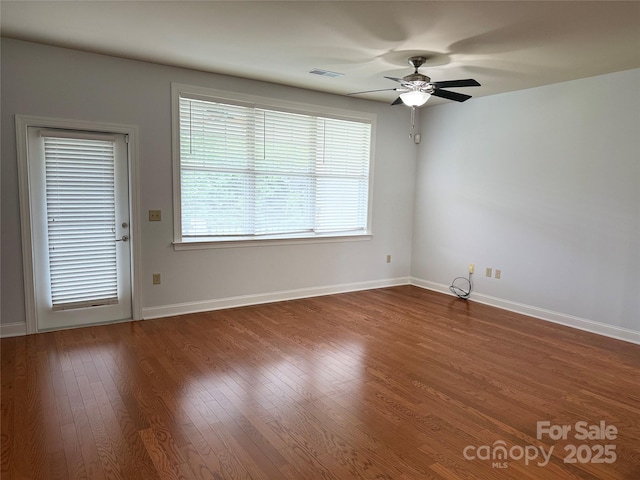 129 Steinbeck Way Unit B, Mooresville, NC 28117 - spare room with ceiling fan, dark wood finished floors, and baseboards