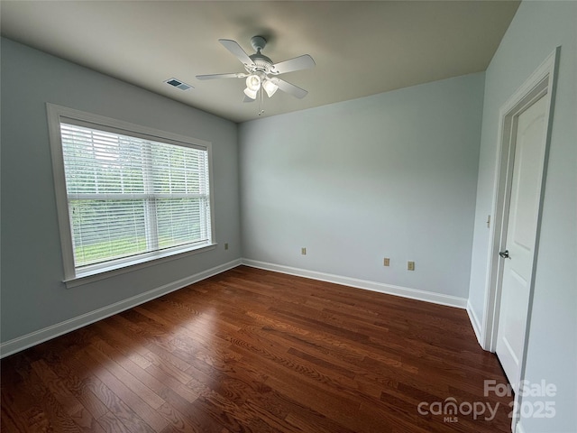 129 Steinbeck Way Unit B, Mooresville, NC 28117 - unfurnished bedroom featuring baseboards, dark wood finished floors, and ceiling fan