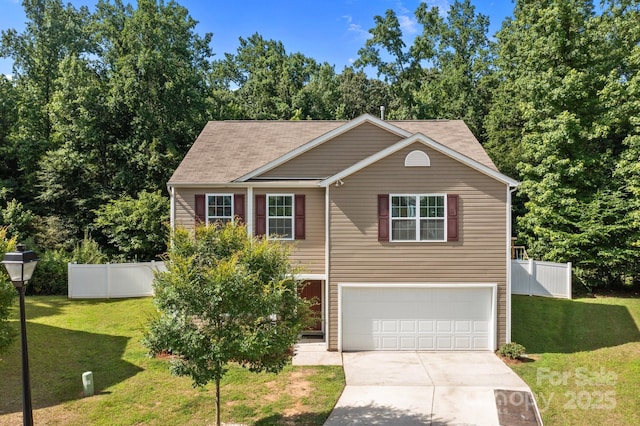 2021 Tarzi Ln, Charlotte, NC 28215 - view of front of home featuring a garage and driveway