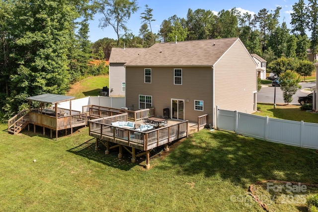 2021 Tarzi Ln, Charlotte, NC 28215 - rear view of house with a deck and a fenced backyard