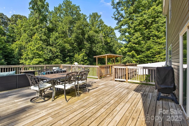 2021 Tarzi Ln, Charlotte, NC 28215 - wooden terrace with outdoor dining area and grilling area