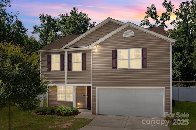 2021 Tarzi Ln, Charlotte, NC 28215 - view of front of home featuring an attached garage and driveway