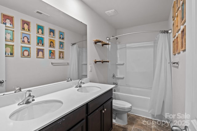 2021 Tarzi Ln, Charlotte, NC 28215 - full bathroom with shower / bath combination with curtain, double vanity, and stone finish floors