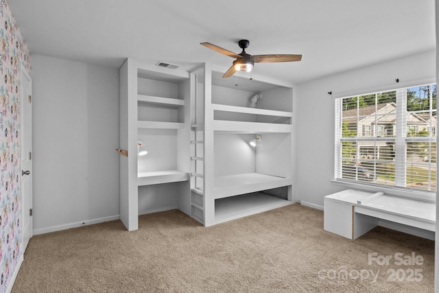 2021 Tarzi Ln, Charlotte, NC 28215 - unfurnished bedroom featuring carpet floors and ceiling fan