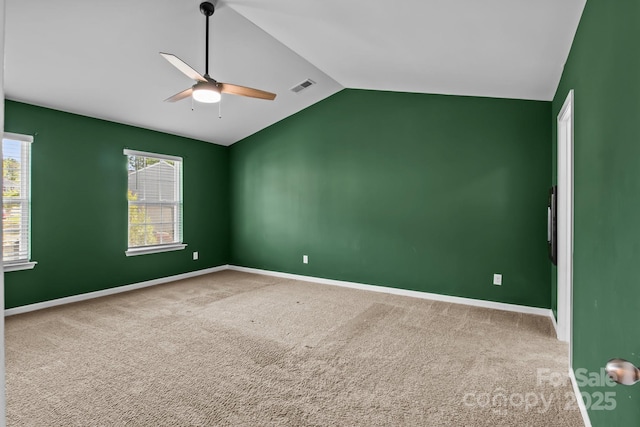 2021 Tarzi Ln, Charlotte, NC 28215 - carpeted spare room featuring a ceiling fan and vaulted ceiling