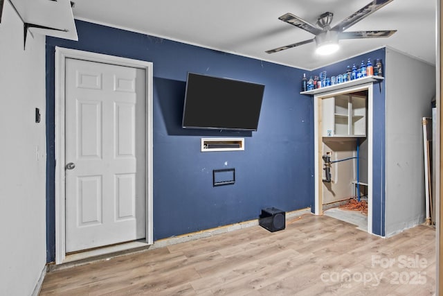 2021 Tarzi Ln, Charlotte, NC 28215 - unfurnished bedroom featuring wood finished floors and a ceiling fan