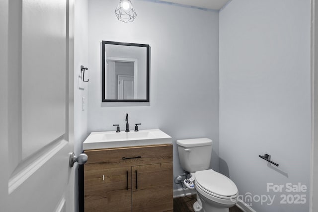2021 Tarzi Ln, Charlotte, NC 28215 - bathroom featuring vanity and toilet
