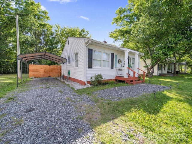 339 Arnold St, Rock Hill, SC 29730 - view of front of home with a carport, a front lawn, and driveway