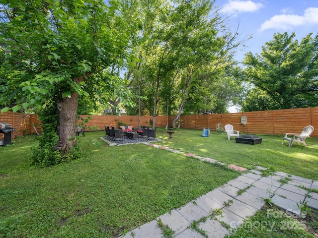 339 Arnold St, Rock Hill, SC 29730 - view of yard with an outdoor living space with a fire pit and a patio